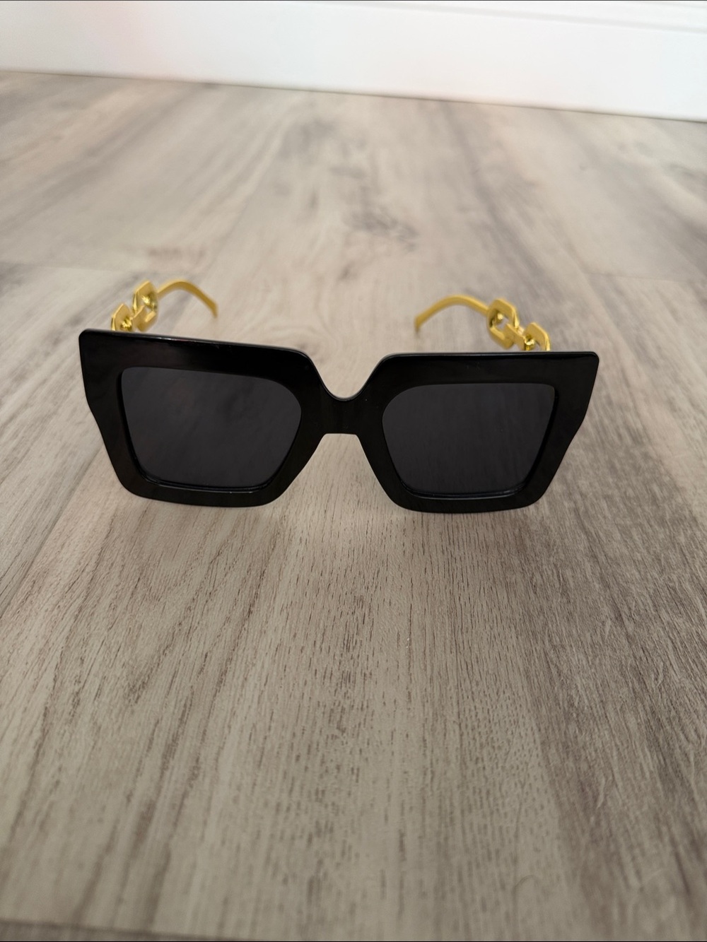 Black Cat-Eye Sunglasses with Gold Chain Temples - Chic Women's Shades